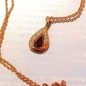 Gold and amethyst teardrop necklace